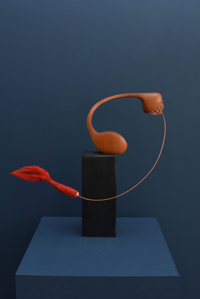 Cherrywood sculpture with rising copper wires on a charred beech base